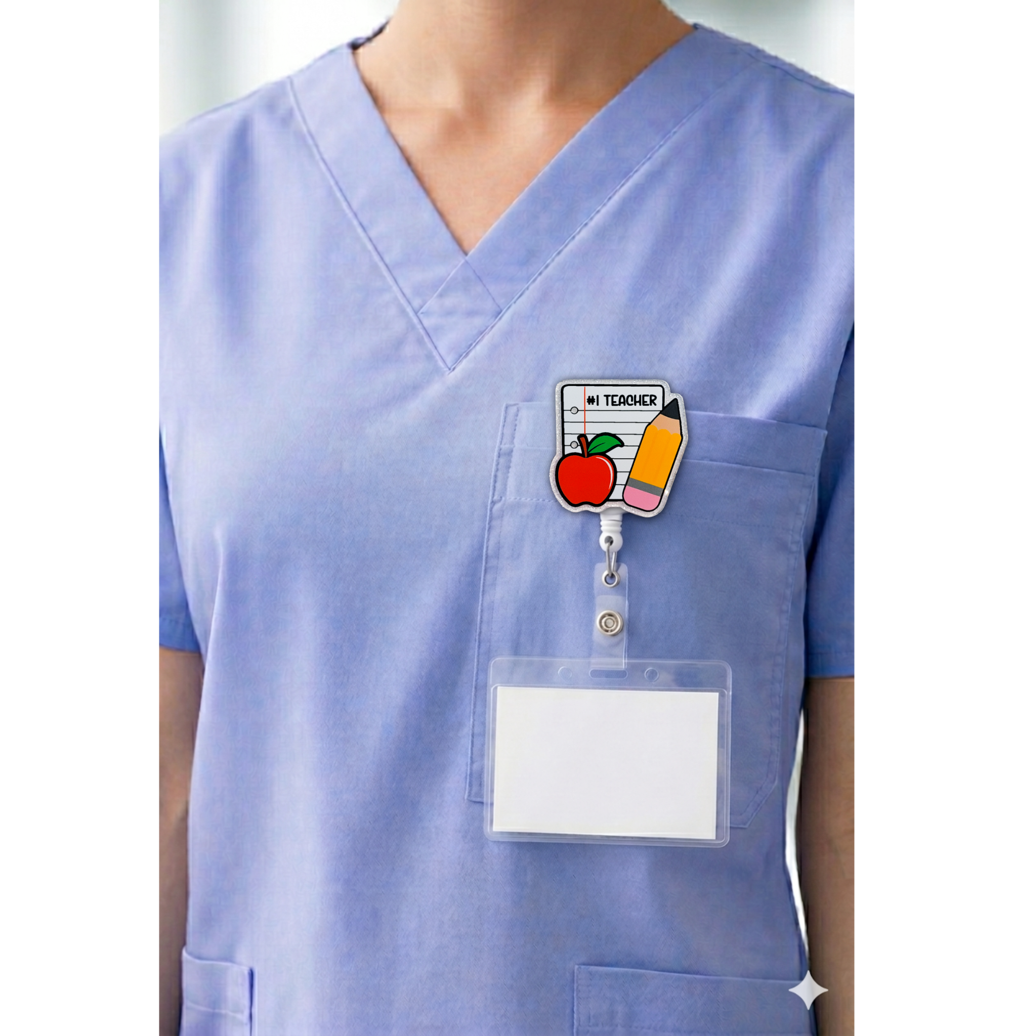 Number one teacher interchangeable badge topper shown on blue scrubs