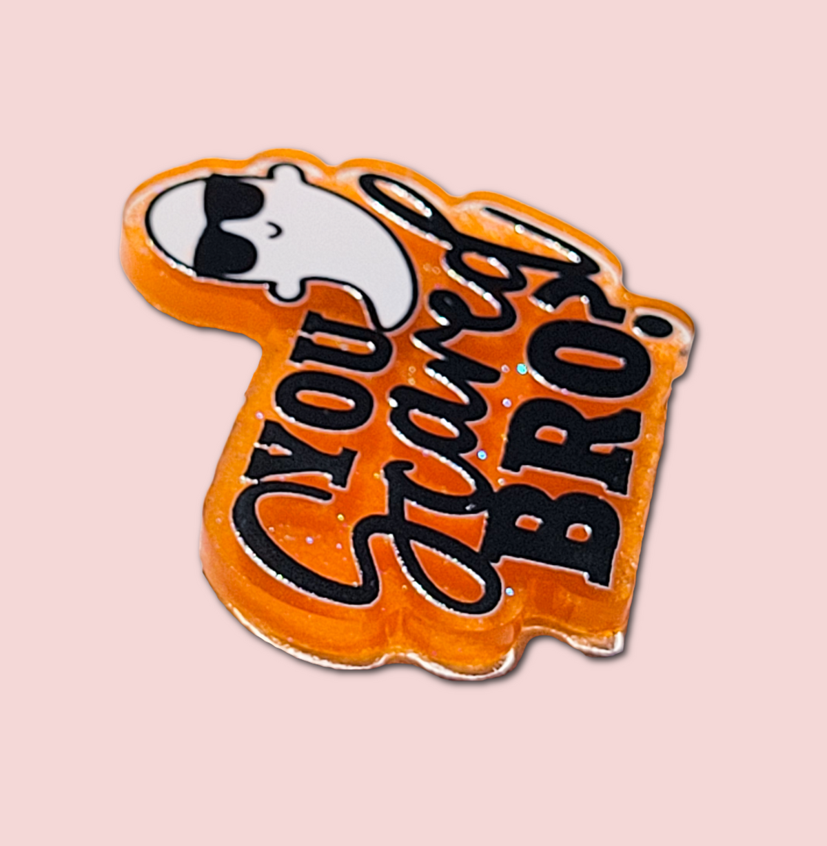 You Scared Bro badge topper attached to an interchangeable badge reel